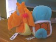 Charizard and Squirtle's backs